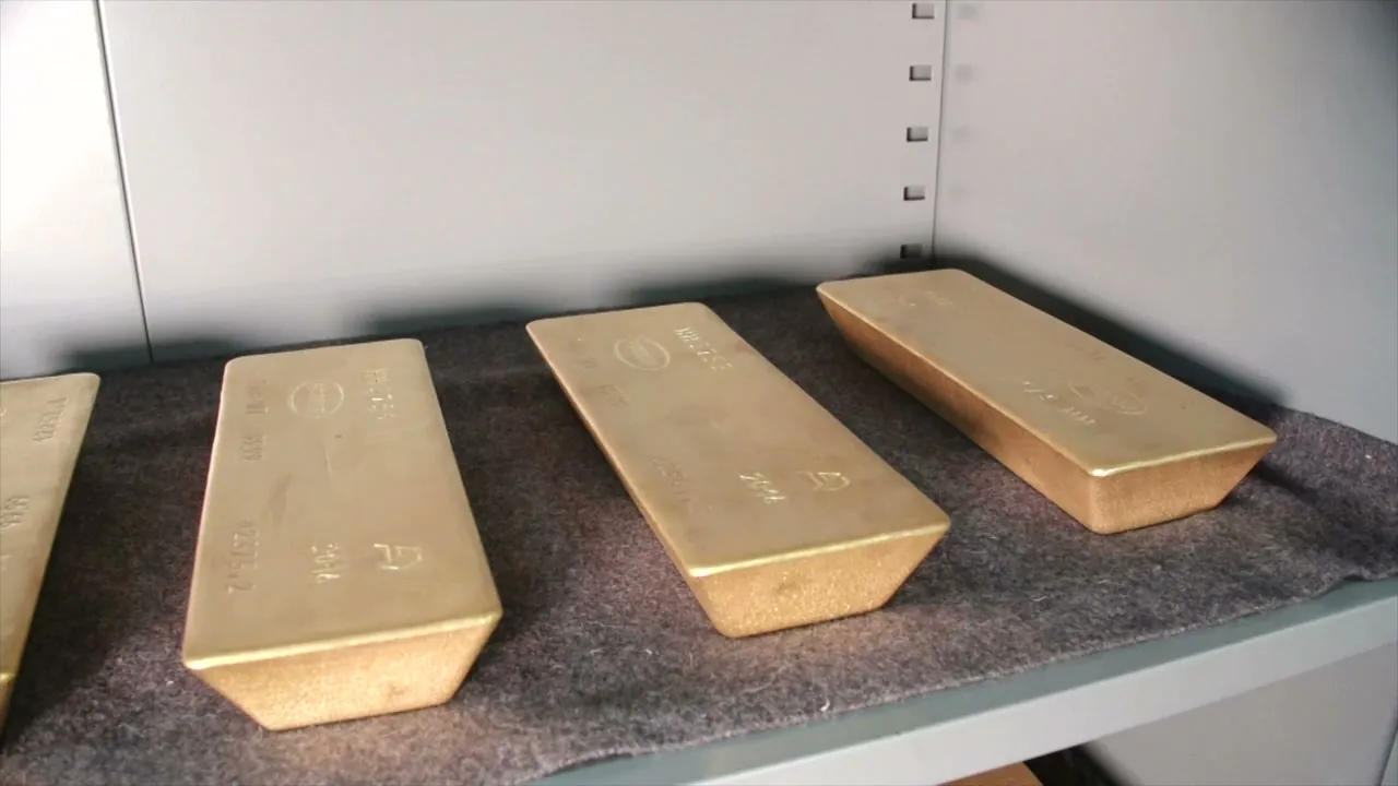 Gold bars on a vault shelf